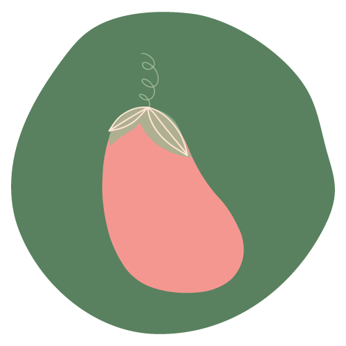 A pear with a pink color and green background.