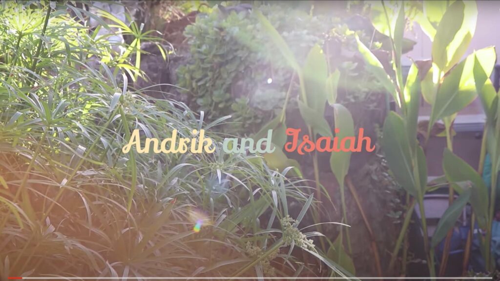 A regenerative agriculture garden photo with the words andrik and Isaiah
