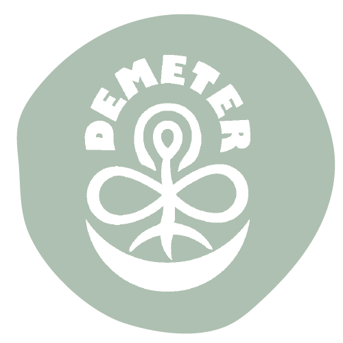 A circular demeterer emblem promoting regenerative agriculture.